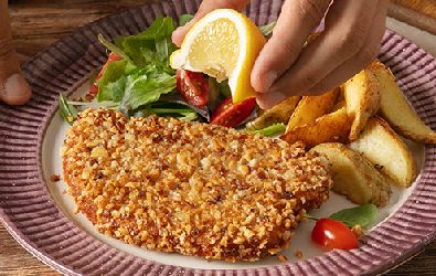 Cotoletta di pollo in crosta di mandorle e Grana Padano