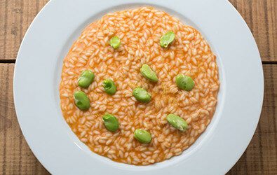 Risotto ai pomodorini arrostiti, fave e Grana Padano